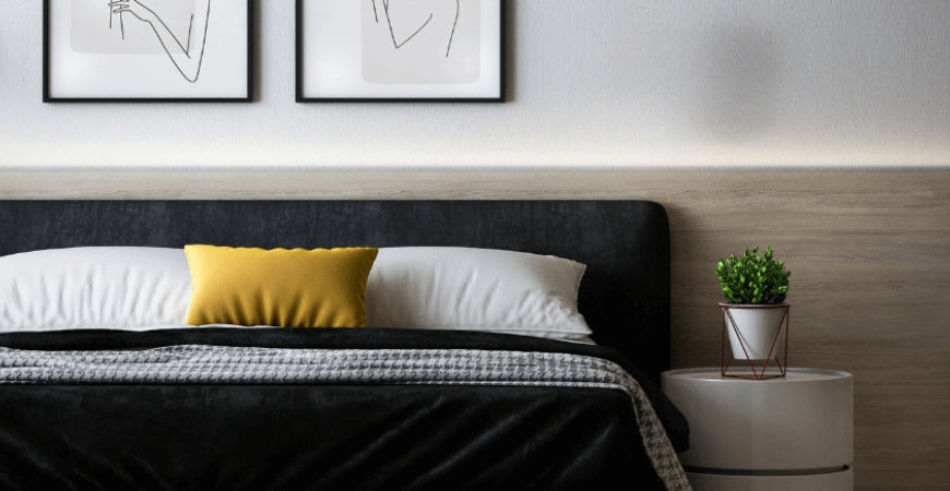 Plaid XXL noir et jeté gris texturé habillant un grand lit moderne – Plaid Addict