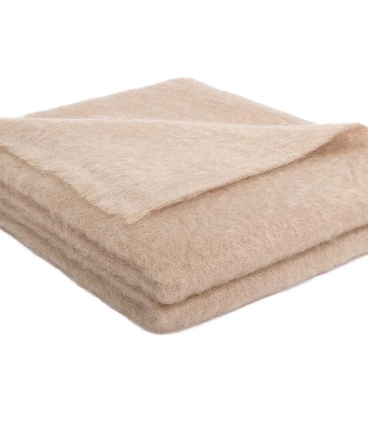 Texture moelleuse et lumineuse du mohair beige grès