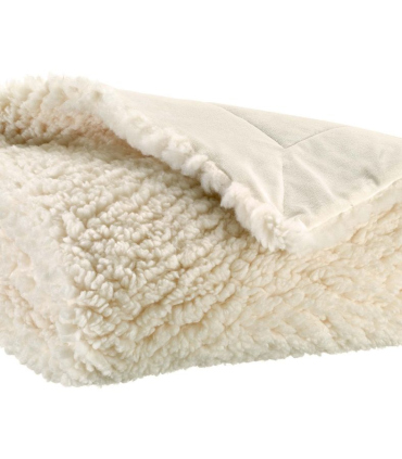 Zoom sur la texture fausse fourrure mouton blanc cassé