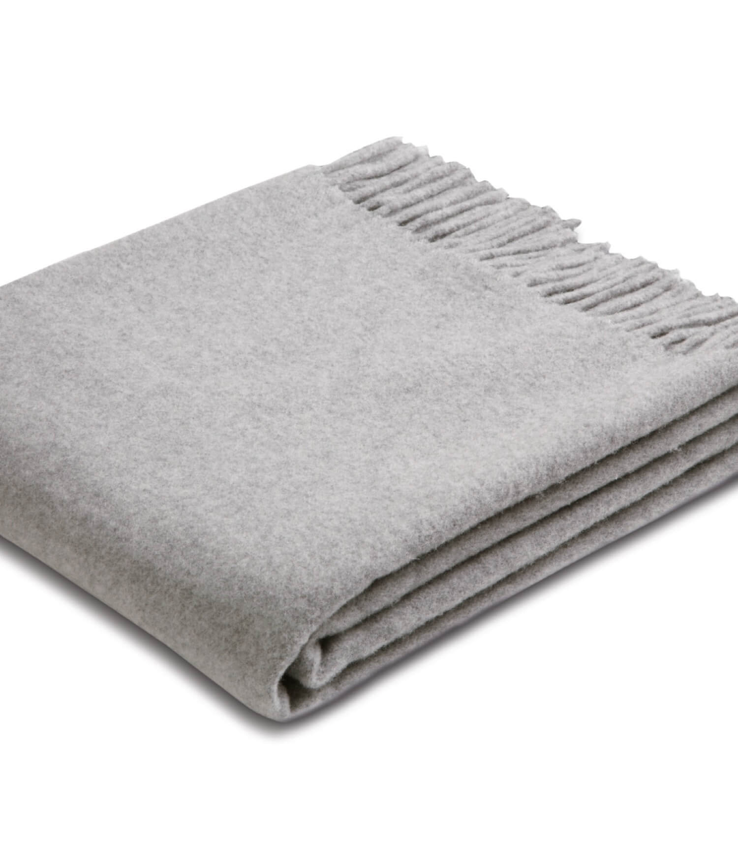 Plaid 100% Pure Laine Gris - Collection CAPRI, Plaid Addict, drapé sur un canapé