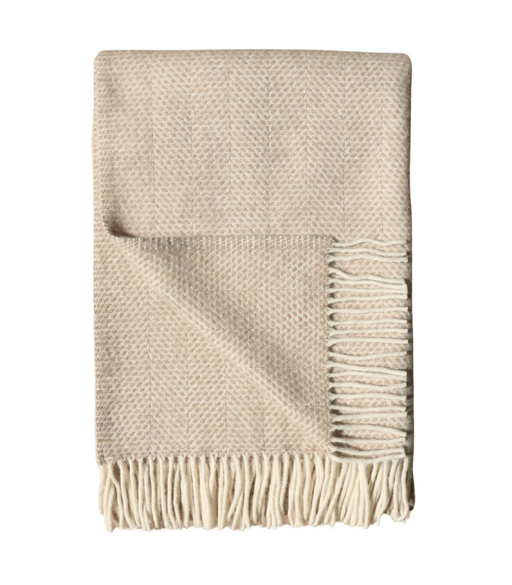 Plaid laine beige - détail texture douce pour canapé et chambre