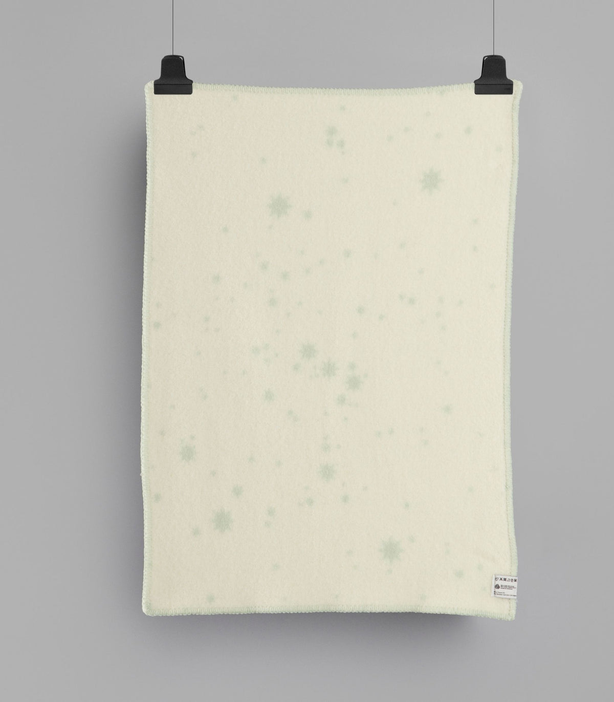 Couverture bébé Orion vert et ecru à plat arrière