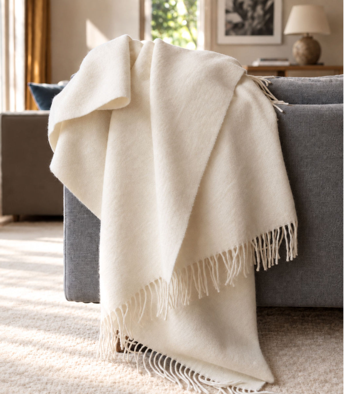 plaid laine blanc cassé edition spéciale plaid addict mis en scène sur canapé
