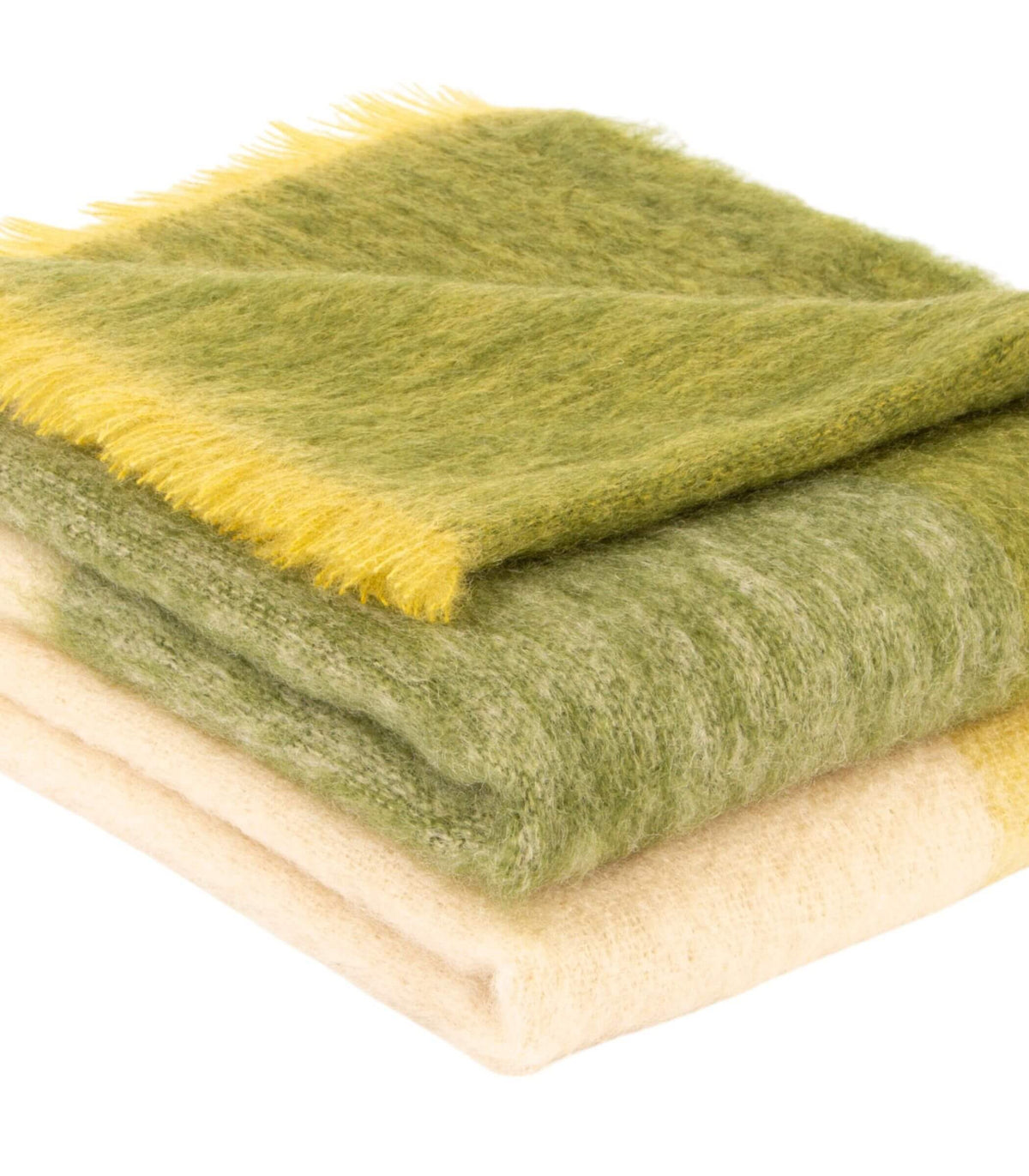 Détail des grands carreaux verts et beige clair sur plaid en mohair